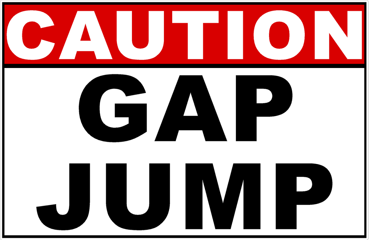 White sign with “CAUTION” in white on a red header and bold black “GAP JUMP” lettering below.