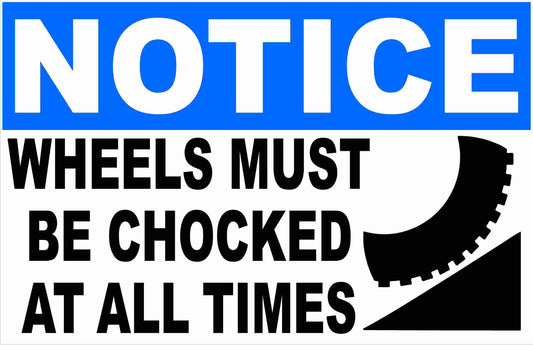 Notice Wheels Must Be Chocked at All Times Sign